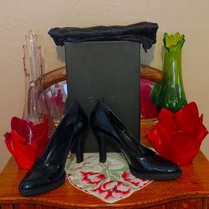 Classic Gucci black patent pumps